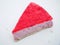 Piece of cake on white background. Cheesecake with raspberry jelly