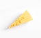Piece of cheese on white background, top view.