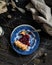 Piece of cherry pie on wooden rustic table