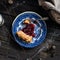 Piece of cherry pie on wooden rustic table