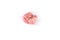 Piece of chewed red bubble gum isolated over white