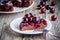 A piece of chocolate cake Clafoutis with cherries