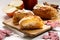 Piece of cinnamon apple pie on a wooden board with fresh apple in background, autumn food concept