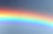 piece of colorful multicolored rainbow in the sky after the stor