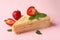 Piece of delicious Napoleon cake on pink background