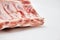 A piece of fresh raw meat pulp on a white background, isolated.