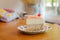 Piece of homemade taro cake in classic plate on table with copy space