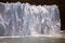 Piece of ice collapses as the Perito Moreno Glacier advances in the Los Glaciares National Park, Patagonia, Argentina