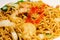 Piece of meatball in fried noodle, close shot