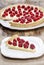 Piece of raspberry tart on wooden table