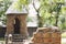 Piece of a ruined brick wall on the background of a watchtower on a playground in the style of a medieval castle