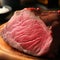 Piece of rump steak on cutting board