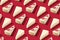 Piece slice cheesecake pattern on red background