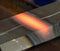 Piece of steel heated red