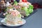 Piece of traditional savory swedish sandwich cake Smorgastorta with bread, shrimps, eggs, caviar, dill, mayonnaise, cucumber and