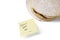 Piece of Victoria sponge cake with \'don\'t eat me\' sign on sticky notepaper