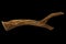Piece of well-worn driftwood isolated on black background with clipping path