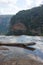 A piece of wood in the water at the top of the Wentworth Falls in the Blue Mountains in Australia