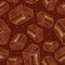 Pieces of aerated chocolate on a brown background