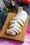 Pieces of chiabats on a cutting board. Italian bread