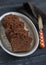 Pieces of chocolate cake on the oval dish