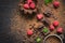 Pieces of chocolate, fresh raspberries and tartlets. Preparation. Food dessert background.