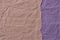 Pieces of creased brown and violet paper background texture