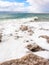 Pieces of crystalline salt on shore of Dead Sea