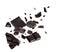 Pieces of dark chocolate falling on background
