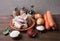 Pieces of fresh fish on a plate, vegetables, flour, tomatoe past