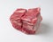 Pieces of fresh raw meat and beef bones on a white background