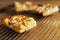 Pieces of homemade apple cake on a baking grid over a wooden tab