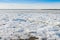 Pieces of ice float on river during the ice drift