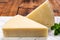 Pieces of matured pecorino romano italian cheese made from sheep milk in Lazio, Sardinia or Tuscany