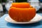 Pieces of native French aged cheese Mimolette, produced in Lille with greyish curst made by special cheese mites close up