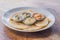 Pieces of pita bread and four kinds of Greek sauces. Greek food