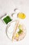 Pieces of raw hake, chukka salad, lemon wedge, fresh herbs, eggs as food preparation concept