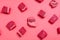 Pieces of raw meat on a pink background. AI generative image