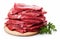 Pieces of raw roast beef meat isolated on white background. Raw meat, cut into pieces