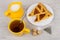 Pieces of shortbread pie, milk jug, sugar on wooden table