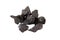 Pieces of shungite mineral on white background