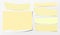 Pieces of torn yellow note, notebook paper strips for text stuck on squared background. Vector illustration