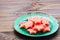 Pieces of watermelon in the form of stars on a ceramic plate