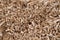 Pieces of wood chip smoking element giving flavor and taste many elements pattern natural beige.
