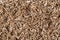 Pieces of wood chip smoking element giving flavor and taste many elements pattern natural beige.