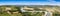 Piemontese landscape including the Tanaro river and the Alps shot from the tower of Barbaresco