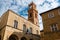 Pienza City Hall, Tuscany. Looking up to partly blue skies