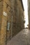 Pienza / Italy 21 2018:  Beautiful old town of Pienza in Tuscany. Sign with the name of Love Street. Tuscany, Italy