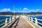 Pier, beach and Apuane mountains in Forte dei Marmi Versilia Tuscany Italy