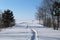 Pier at the big frozen lake and a path to the White lake.